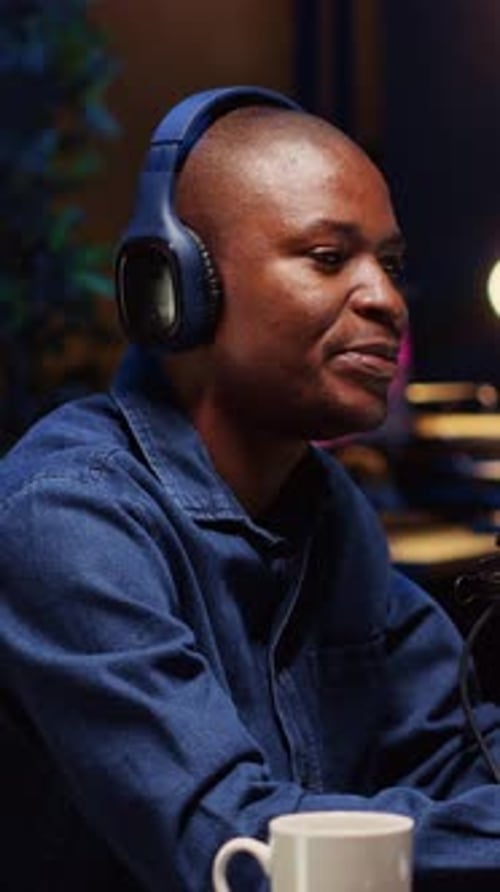 Vertical Video Podcast Presenter Using Professional Audio Equipment to Ensure High Sound Quality