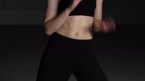 Energetic Young Woman Choreographer Performing in Studio