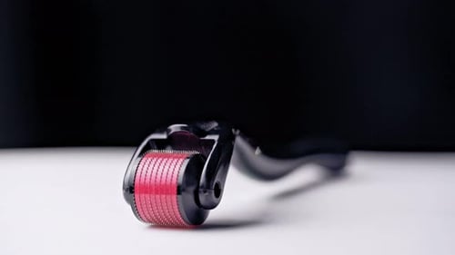 Close Up of a Pink Dermaroller Beauty Product