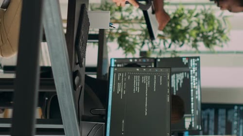 Vertical Video Database Programer Writing Source Code and Developing Security Server with Html