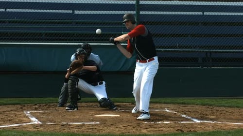 Baseball Player Batting Ball with Catcher and Umpire