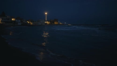Lighthouse Tower Flashes at Night