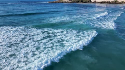 Surfing Waves On The Blue Ocean