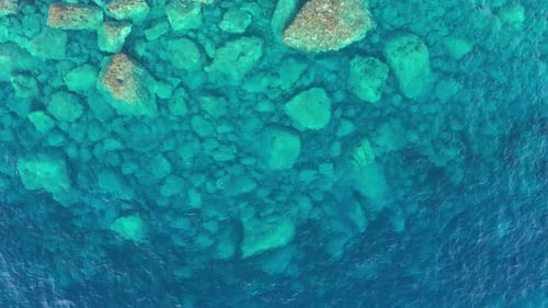 Abstract Background of Deep Sea Waves and Stones Water Ripples