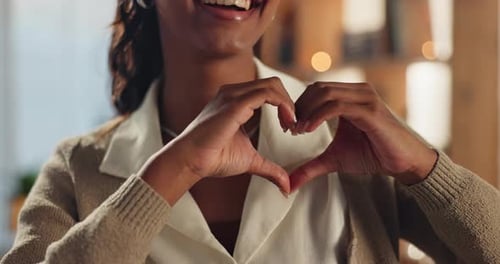 Woman Making Heart Shape With Hands
