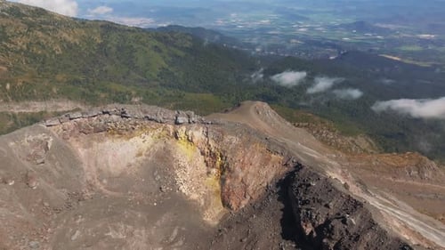 Top View Of Active Colima Volcano Crater Revealing the Nevado de Colima Mountain Peak in the Backgro