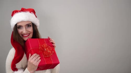 Woman Holds Gift Box For Christmas