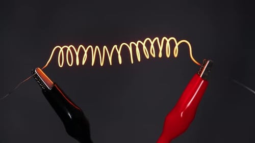 Metal Wire Heating Up and Glowing Orange