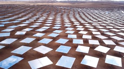 Solar power plant mirrors that focus sun rays upon a collector producing renewable energy