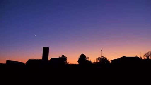 Simple Farm Silhouette at Sunset