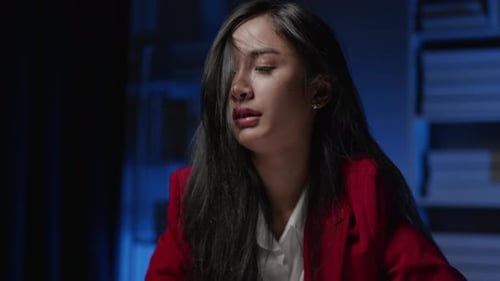 Businesswoman is seriously stressed working overtime bored and burnout due to office syndrome