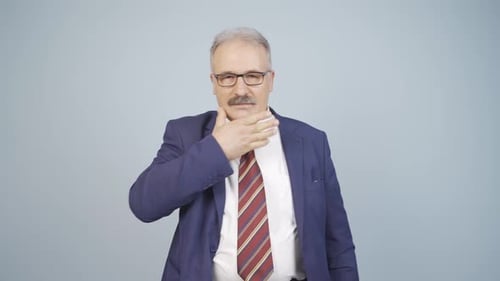 Adult man in suit adjusting himself