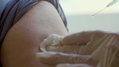Healthcare Worker Giving an Injection Close Up