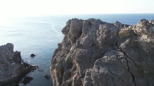 Aerial View of Rock Formation Near the Ocean