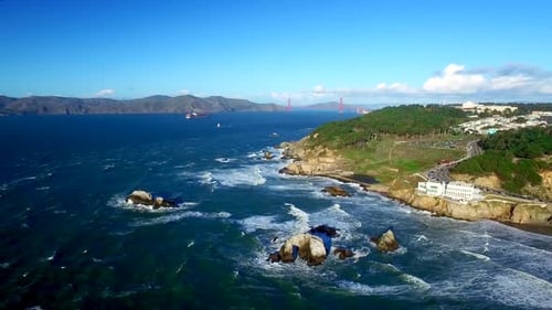 Drone View Of Choppy Ocean And Rocks By San Francisco Beachside 6