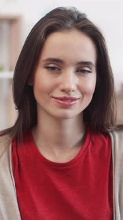 Smiling Young Woman Close-Up Portrait Indoors