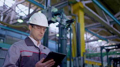 Engineer Man Worker Tablet Heavy Industry Plant Construction Factory Oil Gas Pipeline Manufacture