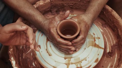Shaping A Clay Pot In A Ceramics Workshop 18