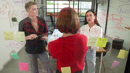 Team Brainstorming Ideas in Modern Office Environment