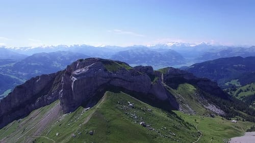 Enjoy the Stunning Views of Mountain Ridges Under a Cloudless Sky on a Summer Day