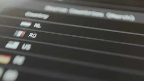 Country Stats on a Screen Zooming Into Flags