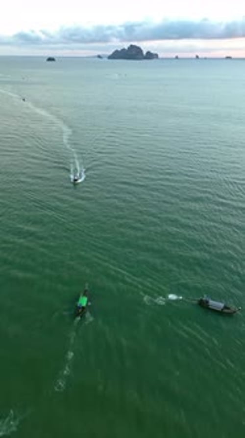 Aerial view of boats sailing on water, Thailand.
