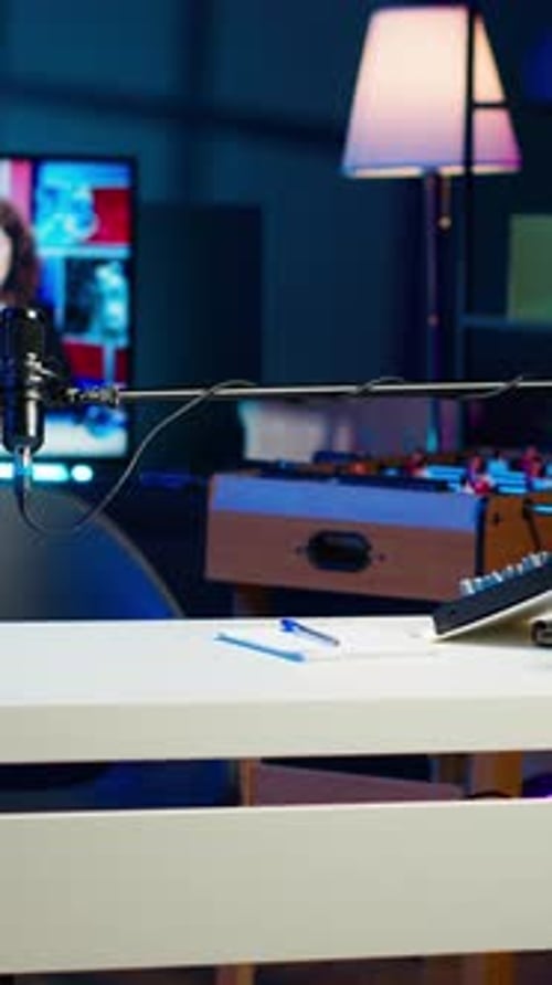 Vertical Video Panning Shot of Empty Home Studio Illuminated with Neon Lights