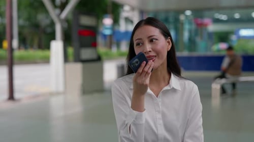 Woman Using Voice to Text on Smartphone