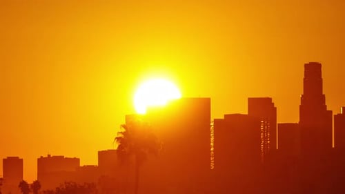 Time Lapse of the sun rising from behind downtown Los Angeles
