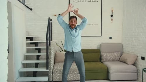 Happy Young Man Dancing at Home Living Room Enjoy Life Funny Dancer Crazy Cozy Apartment Positive