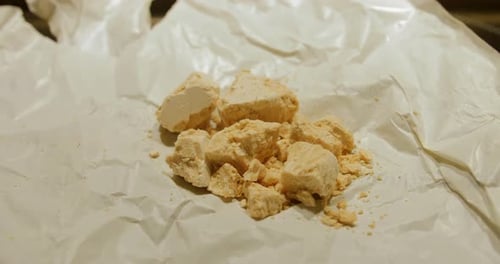 Parchment Paper with Tan Baking Ingredient Close Up