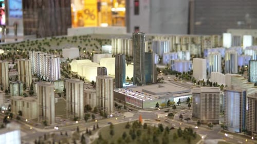 Model Presentation Emphasizing Illuminated City Features Display Of Metropolitan Model Focusing On