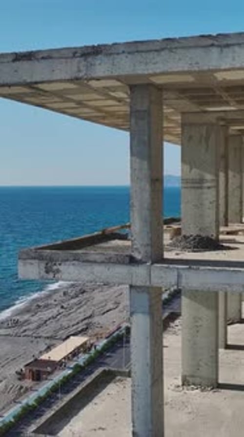 Vertical Video of a Building Frame Ready for the Next Construction Stage With Steel Supports and