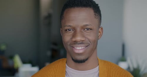 Smiling Man Close Up Portrait in Modern Home