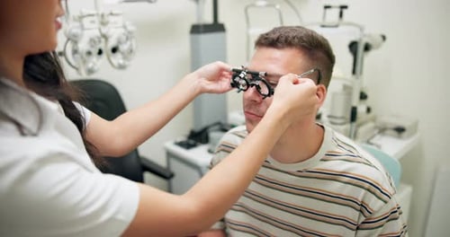 Optometry, trial glasses and man with service, customer and lens with professional and healthcare