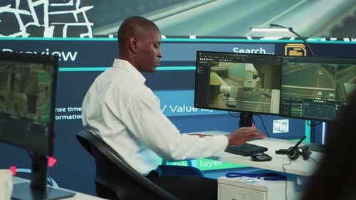 Man Working on Computer in Modern Office