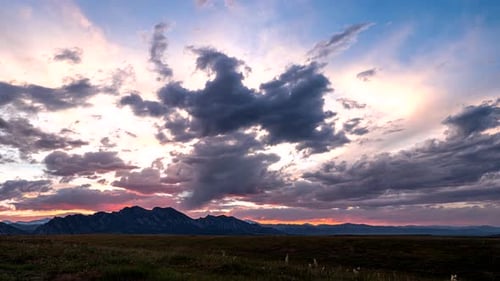 Time lapse of burning sky and clouds over the Rocky Mountains