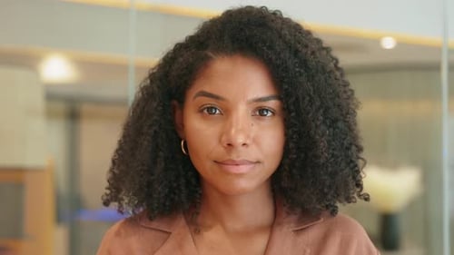 Happy Confident Young African American Business Woman in Office Portrait