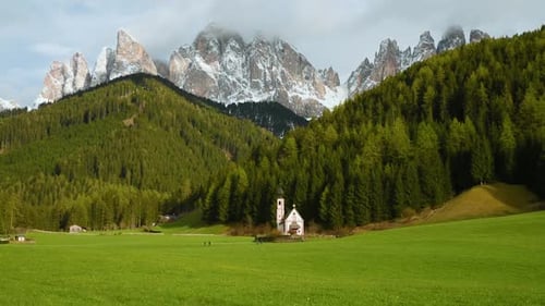 Santa Magdalena Village with Church Church of St John in Dolomites Mountains Val Di Funes Trentino