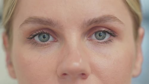 Close Up of Female Blinking Eyes