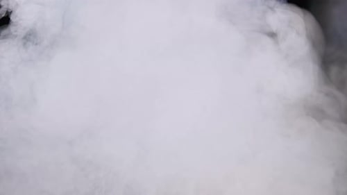 Abstract White Smoke Rising on Black Background