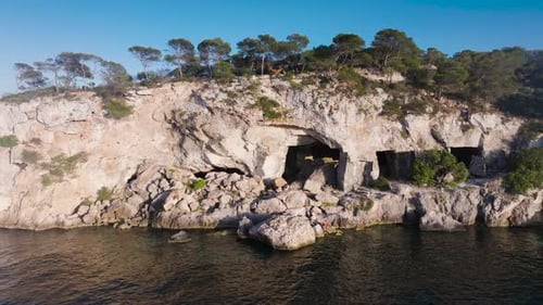 Scenic Caves Along Rocky Coastal Cliffside