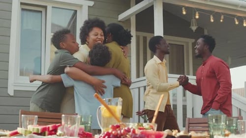 Joyful Family Reunion at Suburban Backyard Party