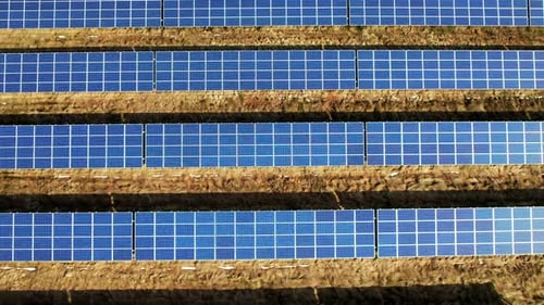 Solar Park: Rows of Huge Photovoltaic Panels on a Rural Field