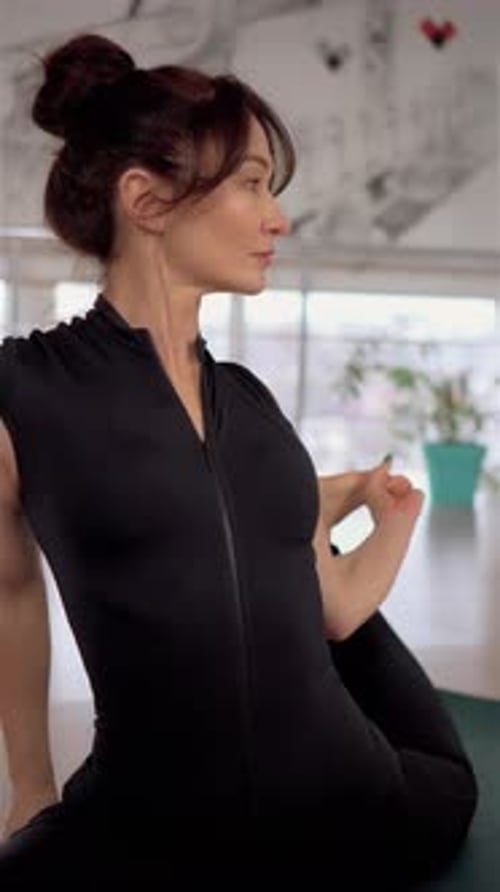 Sport Fitness Training Meditation Young Woman Doing Flexibility Exercises and Asana Poses Vertical
