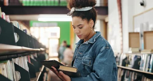 University, student and book with tablet in campus library for fact check study or online course