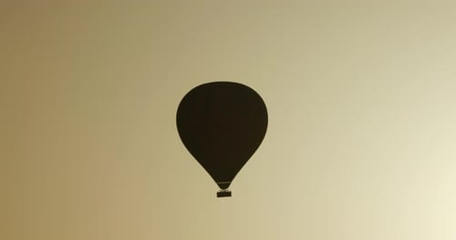 Morning view of a slowly ascending hot air balloon in Cappadocia, Turkey