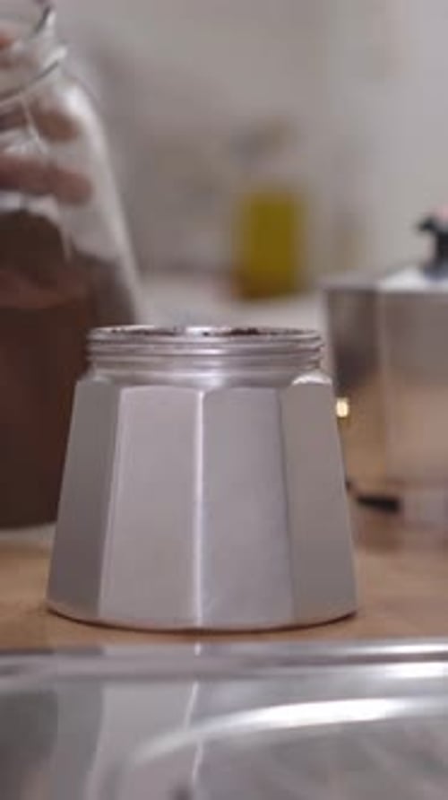 Unrecognizable African American Woman Making Coffee in a Moka Pot at Home