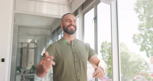 Excited Man Throwing Papers in Modern Office