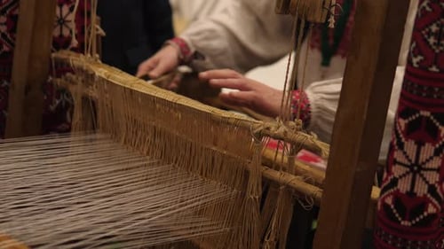 Traditional Weaving on Loom with Embroidered Details